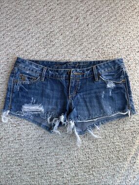 Vintage California whoau Distressed low rise Denim jean Shorts 28 raw hem women